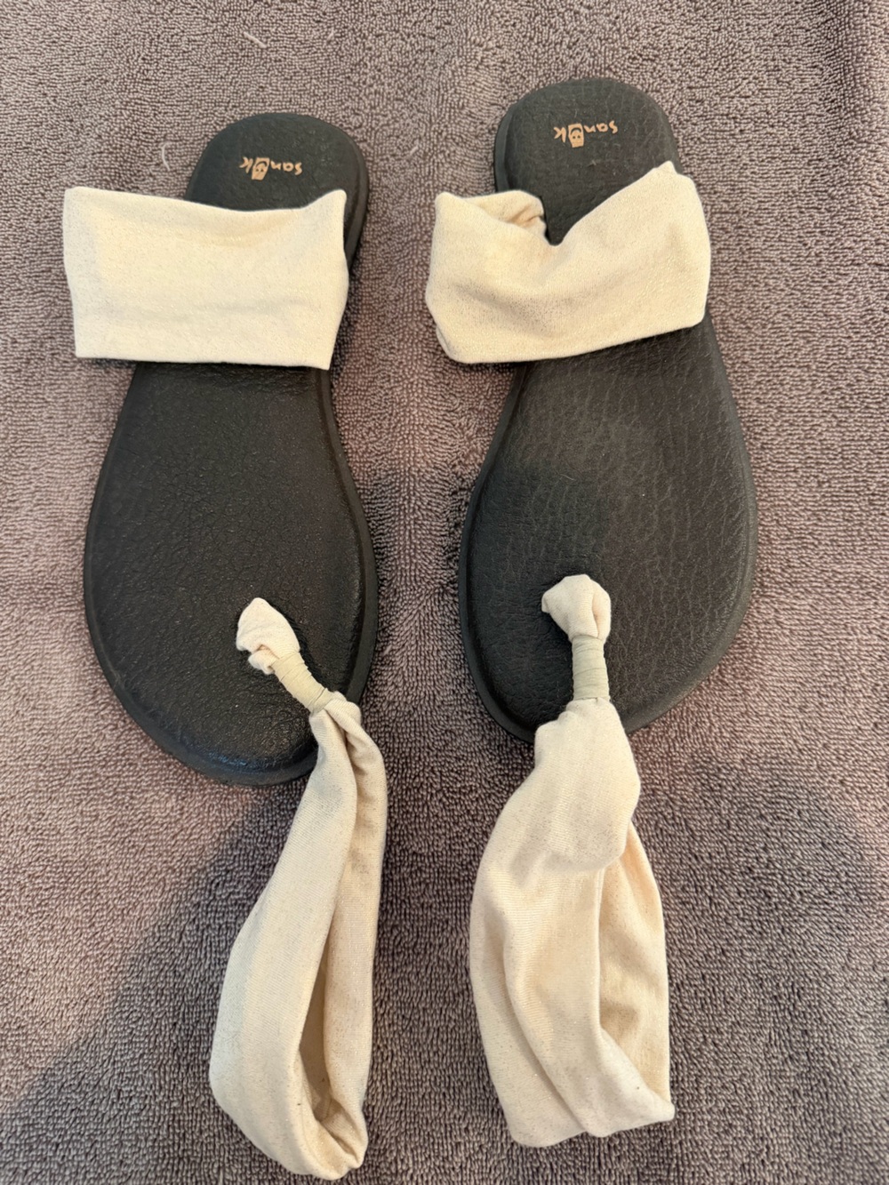 Sanuk Black Footbed Sandals with Cream Fabric Straps